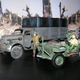 An American soldier inspects the Opel Blitz truck for possible enemy soldiers hiding inside the truck